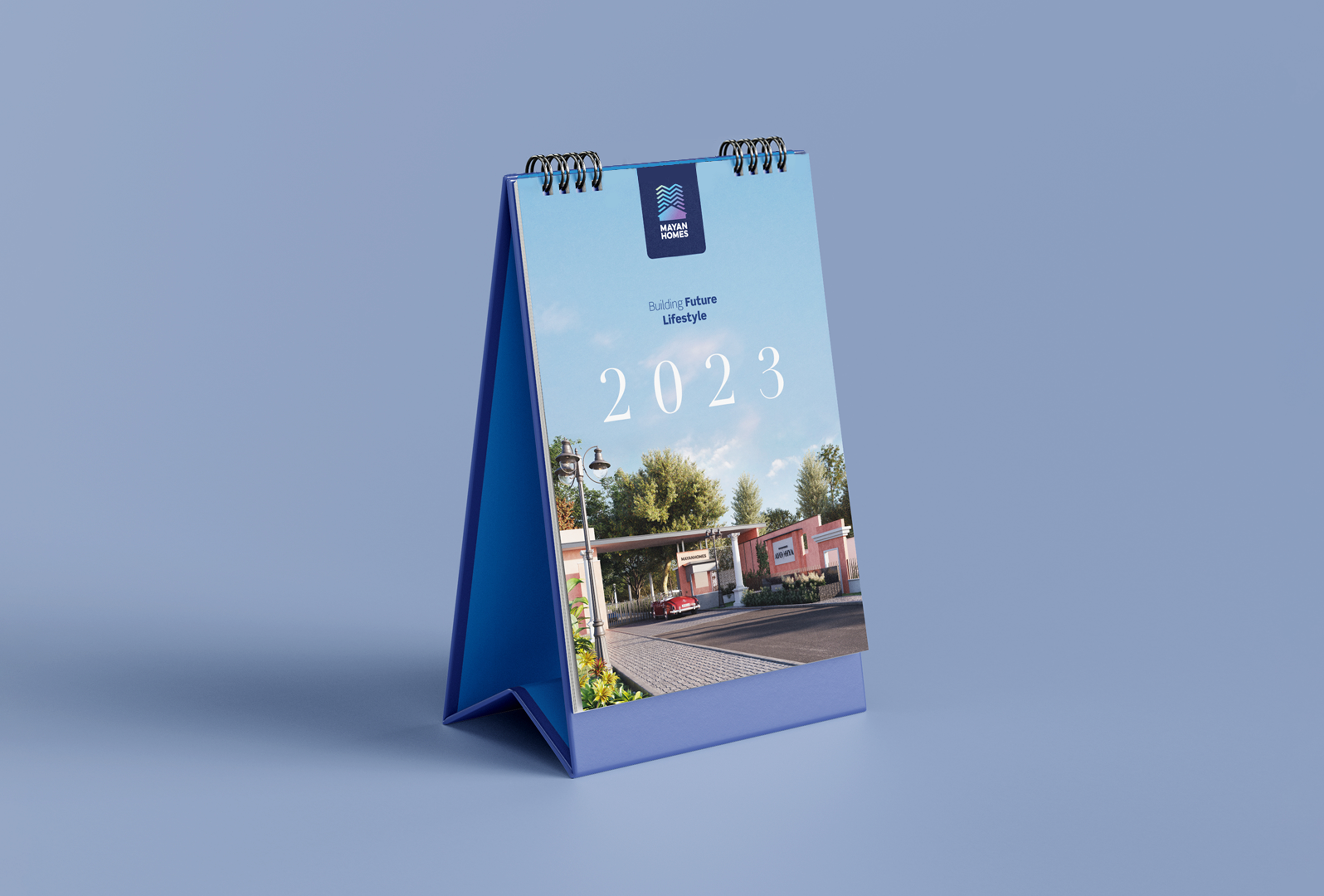 Mayan Homes 2023 Table Calendar with tagline Building Future Lifestyle featuring gated community entrance visual